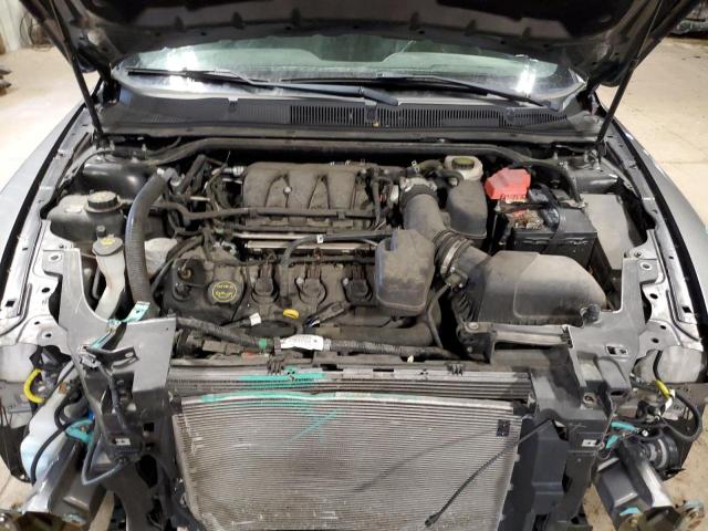 Photo 11 from auction – 2014 FORD TAURUS SEL with VIN 1FAHP2E88EG160818