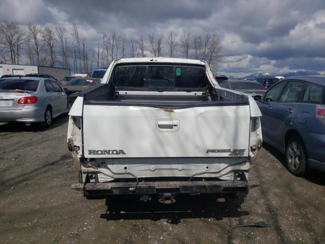 Photo 6 from auction – 2014 HONDA RIDGELINE with VIN 5FPYK1F58EB002553