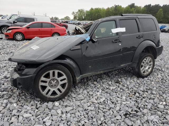 DODGE NITRO 2011 with VIN 1D4PT4GX0BW517317 - Photo from auction