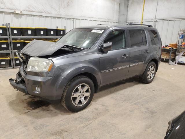 HONDA PILOT TOUR 2011 with VIN 5FNYF4H97BB027499 - Photo from auction