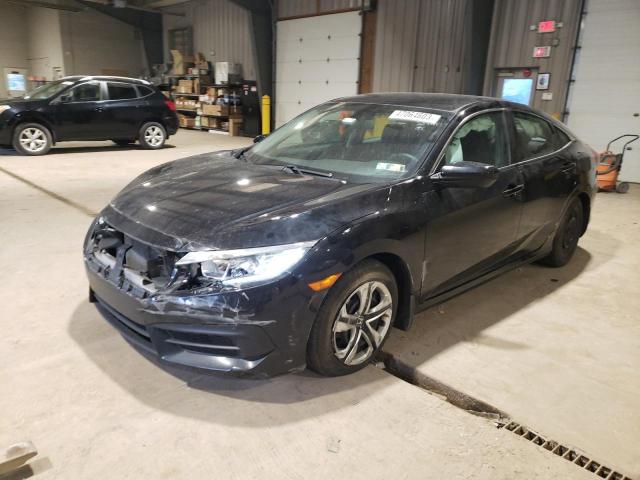 HONDA CIVIC LX 2018 with VIN 2HGFC2F57JH512658 - Photo from auction