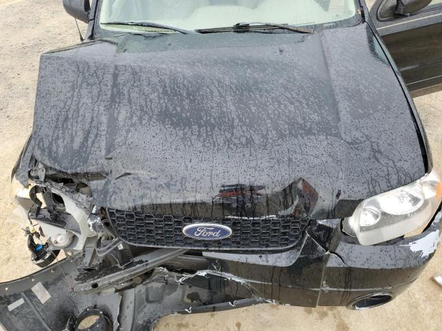 Photo 11 from auction – 2005 FORD ESCAPE LIM with VIN 1FMYU04145KD40883