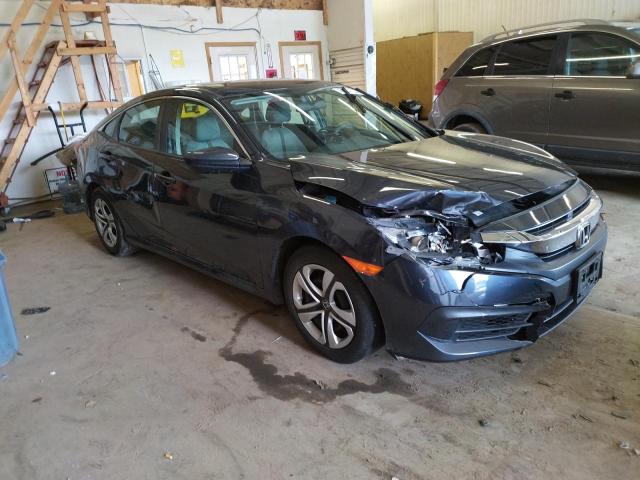Photo 4 from auction – 2018 HONDA CIVIC LX with VIN 19XFC2F50JE023786