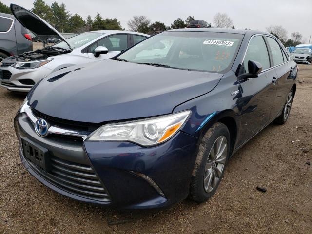 TOYOTA CAMRY HYBR 2016 with VIN 4T1BD1FK2GU185064 - Photo from auction