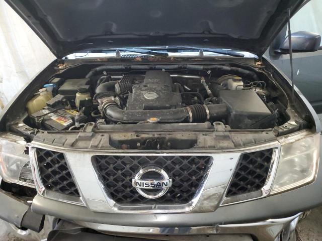 Photo 11 from auction – 2006 NISSAN FRONTIER K with VIN 1N6AD06W16C469977