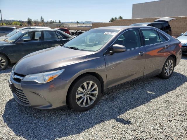 TOYOTA CAMRY LE 2017 with VIN 4T1BF1FK6HU305590 - Photo from auction