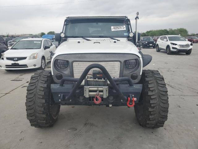 Photo 5 from auction – 2014 JEEP WRANGLER U with VIN 1C4BJWDG6EL218269