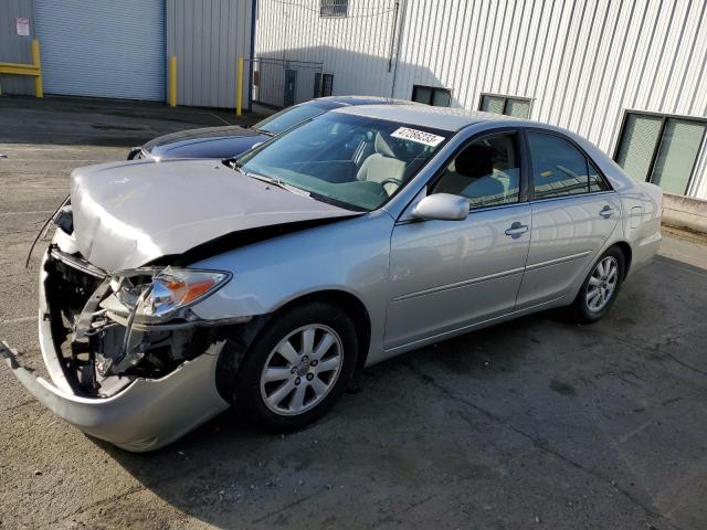 Photo 1 from auction – 2002 TOYOTA CAMRY LE with VIN 4T1BE30K42U059895