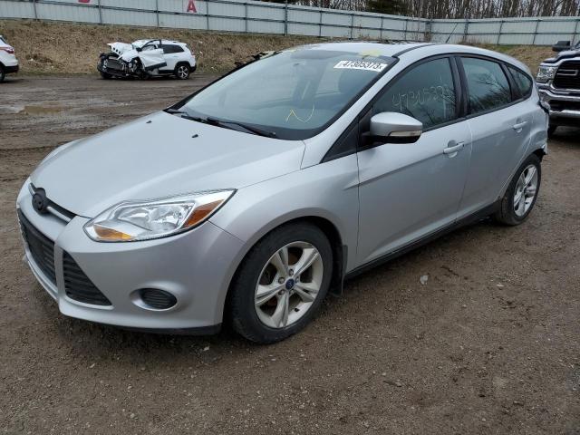 FORD FOCUS SE 2014 with VIN 1FADP3K29EL450402 - Photo from auction