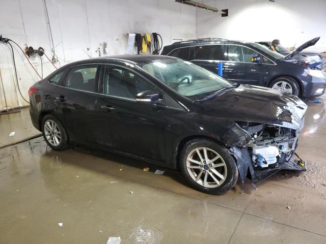 Foto 4 de la subasta – 2017 FORD FOCUS SE con VIN 1FADP3F24HL272106