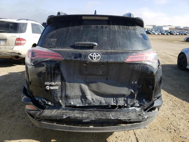 Photo 6 from auction – 2018 TOYOTA RAV4 LE with VIN 2T3ZFREV9JW509502