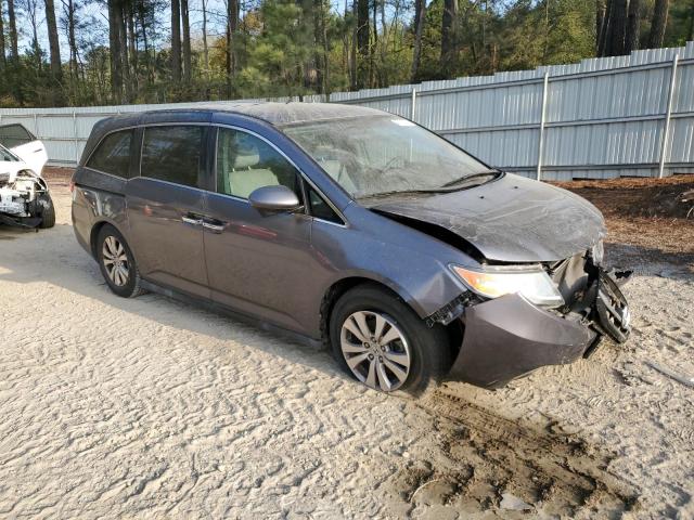 Photo 4 from auction – 2014 HONDA ODYSSEY EX with VIN 5FNRL5H41EB108025