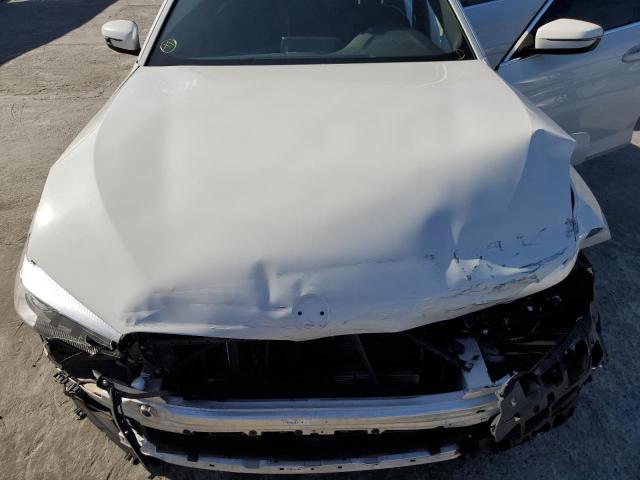 Photo 11 from auction – 2019 BMW 530E with VIN WBAJA9C54KB389257