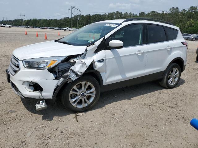 FORD ESCAPE SE 2018 with VIN 1FMCU9GD9JUA43546 - Photo from auction