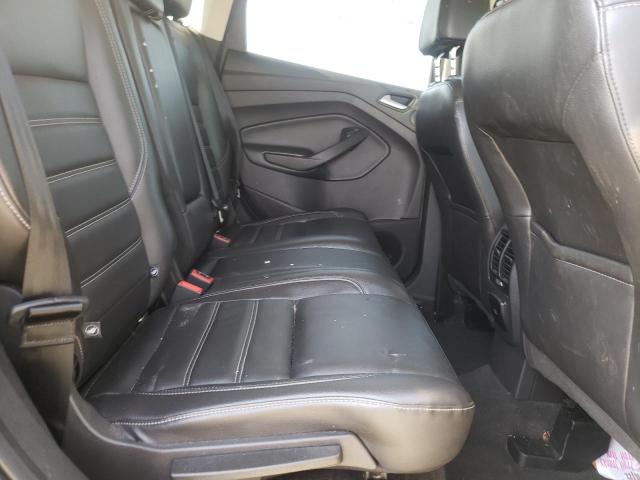 Photo 11 from auction – 2017 FORD ESCAPE TIT with VIN 1FMCU0J97HUB73254