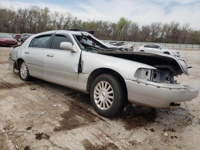 Photo 4 from auction – 2004 LINCOLN TOWN CAR U with VIN 1LNHM83W04Y677333