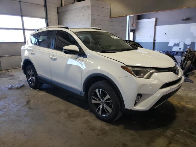 Photo 4 from auction – 2016 TOYOTA RAV4 XLE with VIN JTMWFREV3GJ072140