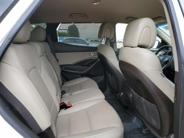 Photo 11 from auction – 2018 HYUNDAI SANTA FE S with VIN 5NMZU4LA1JH089103