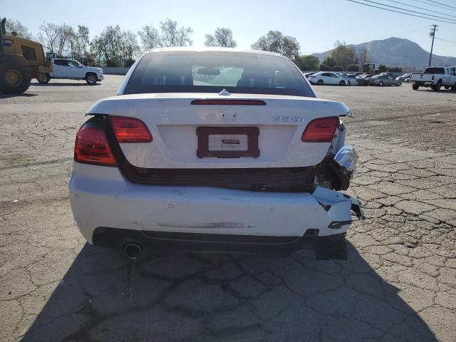 Photo 6 from auction – 2011 BMW 335 I with VIN WBADX7C57BE743139