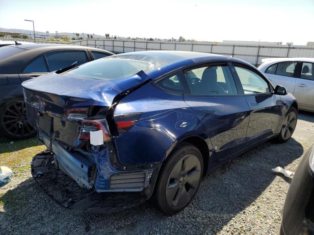 Foto 3 de la subasta – 2022 TESLA MODEL 3 con VIN 5YJ3E1EA1NF373059