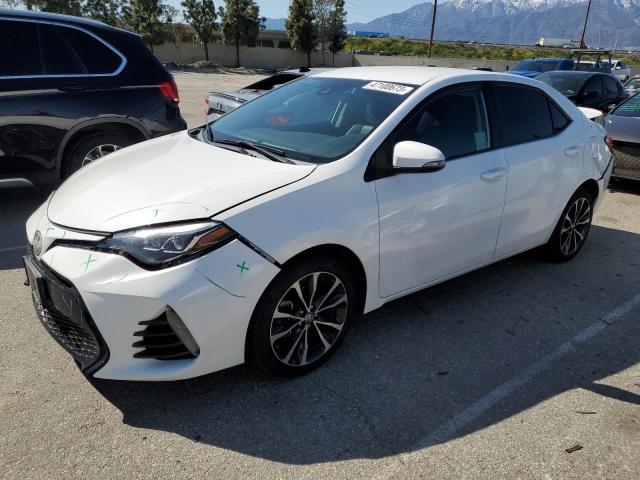 TOYOTA COROLLA L 2017 with VIN 5YFBURHE1HP685967 - Photo from auction