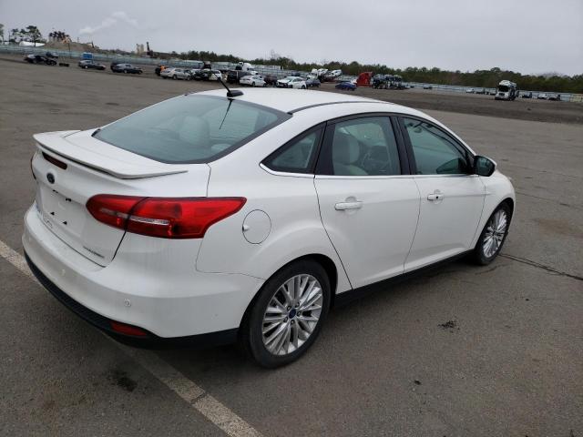 Photo 3 from auction – 2015 FORD FOCUS TITA with VIN 1FADP3J20FL291529