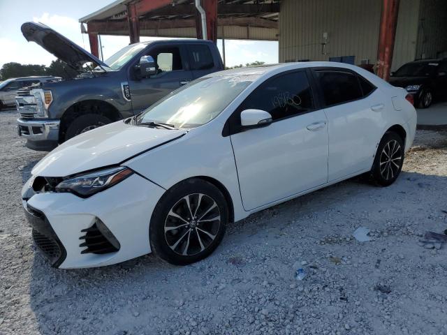 TOYOTA COROLLA L 2019 with VIN 5YFBURHE5KP872071 - Photo from auction