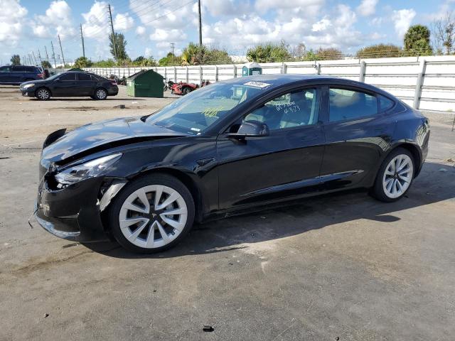 TESLA MODEL 3 2022 with VIN 5YJ3E1EB7NF186983 - Photo from auction