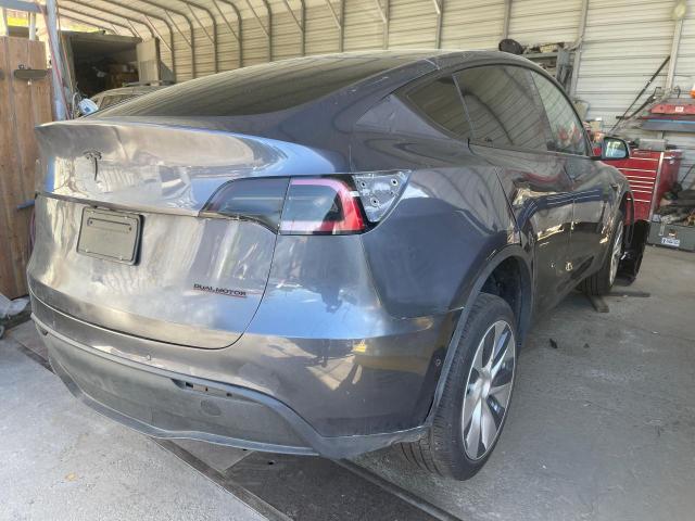 Photo 4 from auction – 2022 TESLA MODEL Y with VIN 7SAYGDEE2NF359386