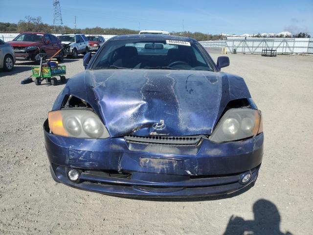 Photo 5 from auction – 2003 HYUNDAI TIBURON with VIN KMHHM65D13U074168