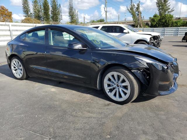 Photo 4 from auction – 2022 TESLA MODEL 3 with VIN 5YJ3E1EB7NF186983