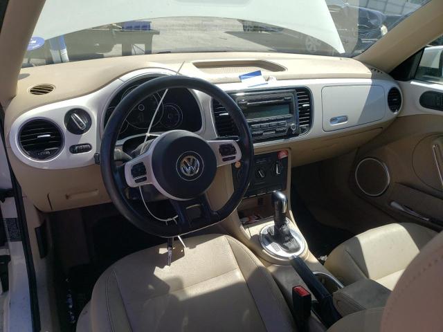 Photo 8 from auction – 2014 VOLKSWAGEN BEETLE with VIN 3VWJP7AT5EM628137