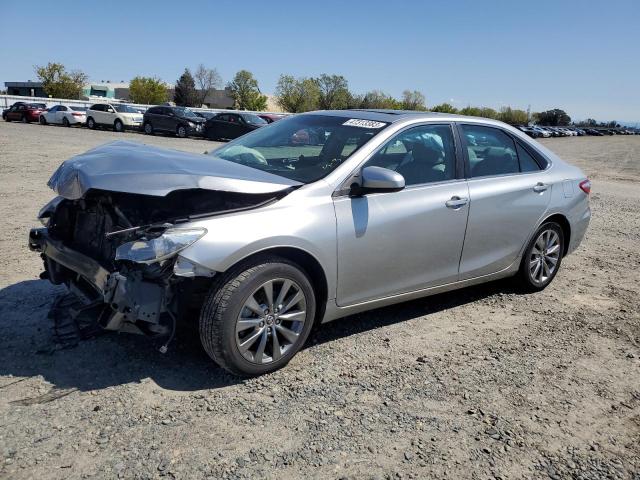 TOYOTA CAMRY LE 2017 with VIN 4T1BF1FK9HU725621 - Photo from auction