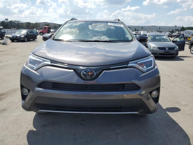 Photo 5 from auction – 2018 TOYOTA RAV4 LIMIT with VIN JTMYFREV3JJ196182