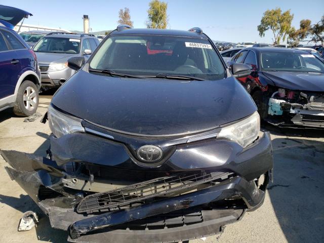 Photo 5 from auction – 2018 TOYOTA RAV4 LE with VIN 2T3BFREVXJW747781
