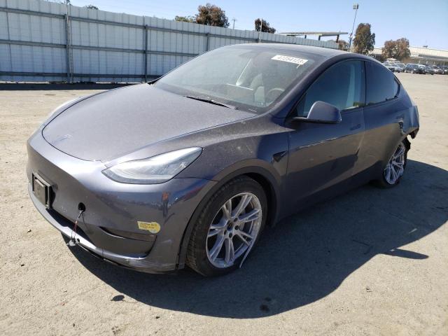 TESLA MODEL Y 2021 with VIN 5YJYGDEE1MF198475 - Photo from auction