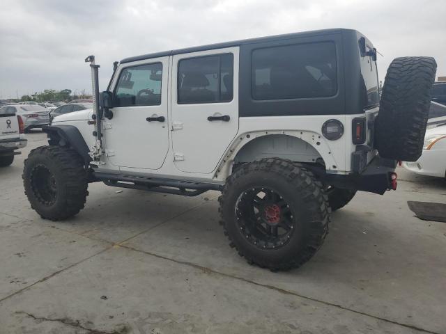 Photo 2 from auction – 2014 JEEP WRANGLER U with VIN 1C4BJWDG6EL218269
