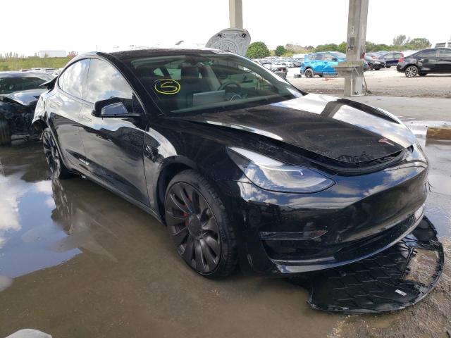 Photo 4 from auction – 2021 TESLA MODEL 3 with VIN 5YJ3E1EC2MF061106