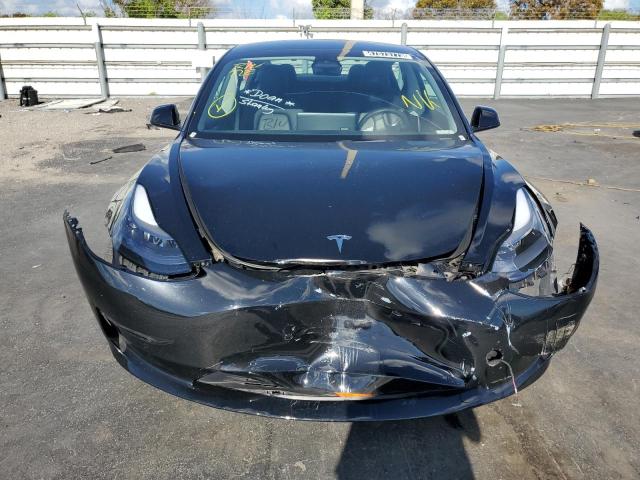 Photo 5 from auction – 2022 TESLA MODEL 3 with VIN 5YJ3E1EB7NF186983