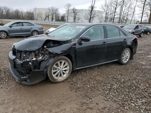 TOYOTA CAMRY HYBR 2014 with VIN 4T1BD1FK4EU106443 - Photo from auction