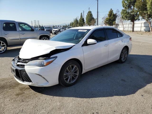 TOYOTA CAMRY LE 2017 with VIN 4T1BF1FKXHU352086 - Photo from auction