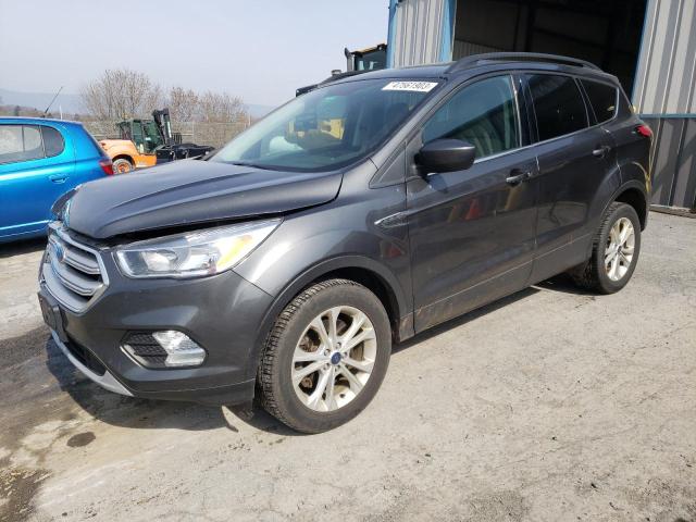 FORD ESCAPE SE 2018 with VIN 1FMCU9GD8JUB65542 - Photo from auction