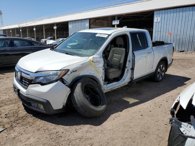 HONDA RIDGELINE 2018 with VIN 5FPYK3F74JB002878 - Photo from auction