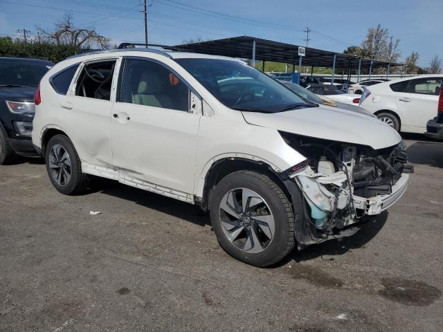Photo 4 from auction – 2015 HONDA CR-V TOURI with VIN 5J6RM4H97FL089394