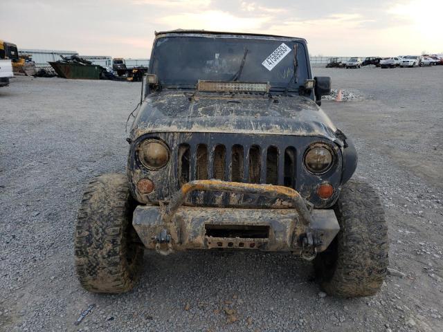 Photo 5 from auction – 2012 JEEP WRANGLER U with VIN 1C4BJWDG0CL228664