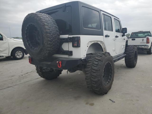Photo 3 from auction – 2014 JEEP WRANGLER U with VIN 1C4BJWDG6EL218269
