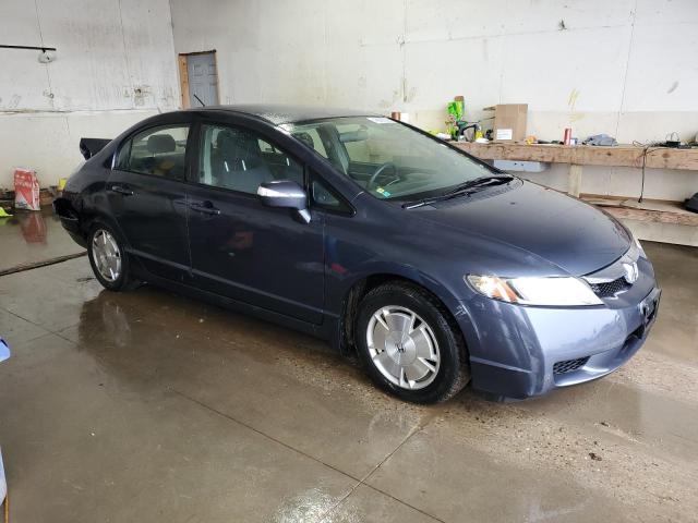 Photo 4 from auction – 2010 HONDA CIVIC HYBR with VIN JHMFA3F23AS004114