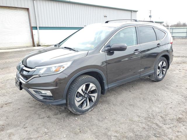 HONDA CR-V TOURI 2015 with VIN 5J6RM4H99FL074217 - Photo from auction