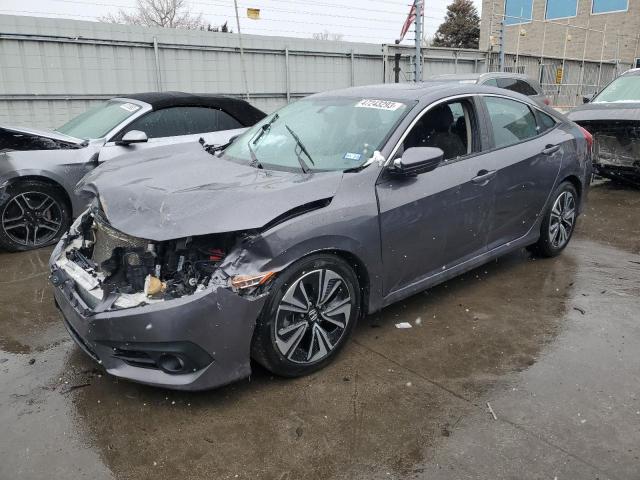 HONDA CIVIC EX 2017 with VIN 19XFC1F33HE003521 - Photo from auction