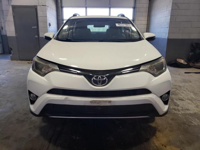 Photo 5 from auction – 2016 TOYOTA RAV4 XLE with VIN JTMWFREV3GJ072140